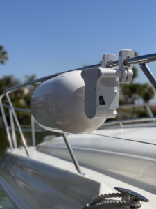A fender system installed next to a boat fender