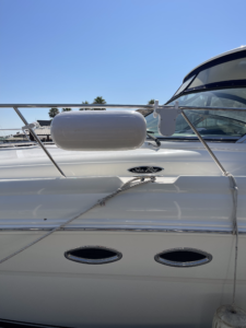 A fender system installed next to a boat fender